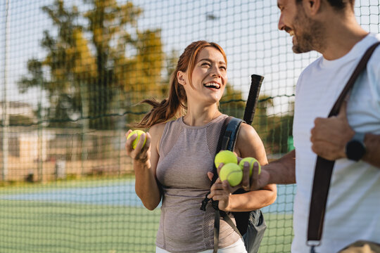 Two friends going to play tennis