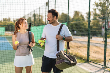Two friends going to play tennis