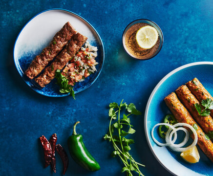 Beef and chicken Kebab with cilantro, onion and spices