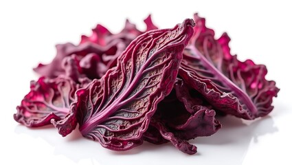 Obraz premium Fresh purple cabbage leaves piled together, showcasing texture and color details