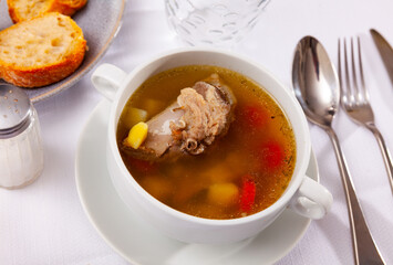Delicious thick rustic style soup cooked in meat stock with pork and vegetables.