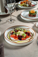 A gourmet salad with fresh beets, vibrant carrots, and a rich creamy dressing enhancing flavor