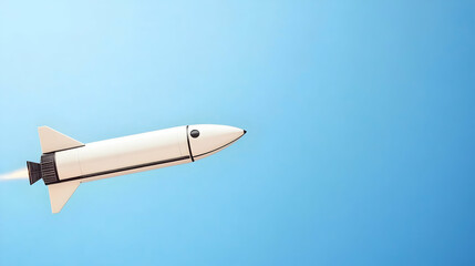 White rocket launching against a clear blue sky.