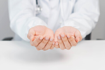 Closeup Hand doctor, Closeup of unrecognizable doctor holding invisible object on his open palms, standing over white background, cropped image ,Doctor holding something on white background, closeup