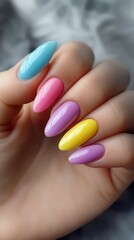 Colorful Pastel Nails with Stylish Shiny Finish on Elegant Hand