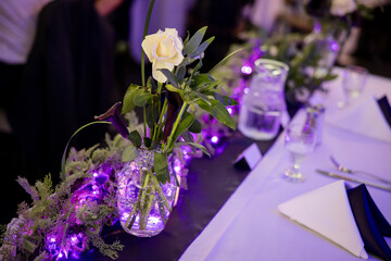 Purple light flower vases and decorations for wedding reception