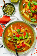 Minestrone soup with pesto.style hugge.selective focus