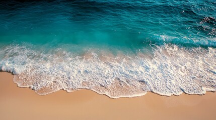 Serene Coastal Landscape: Azure Ocean Waves Crashing on a Sunny Beach