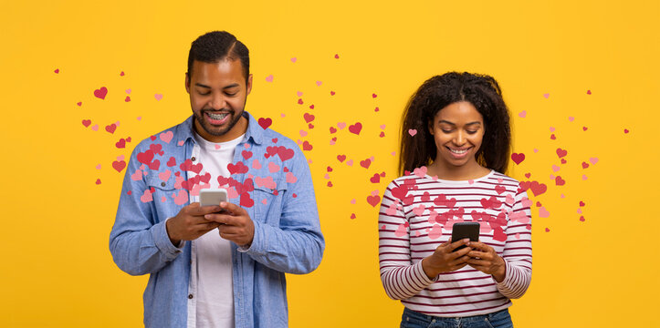 A couple enjoys St. Valentine's Day by exchanging affectionate messages through their smartphones. Hearts surround them, highlighting their love and connection during this special celebration.