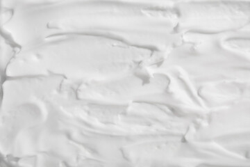 Texture of white cream as background
