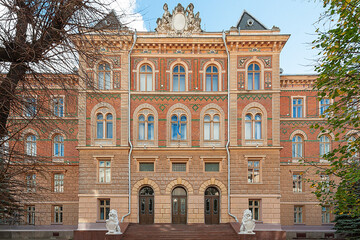 Naklejka premium Old building facade of red bricks in Chernivtsi, Ukraine