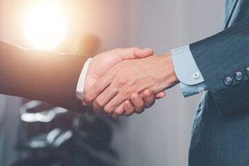 Businessman handshake for teamwork of business merger and acquisition,successful negotiate,hand...