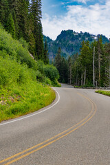 Naklejka premium Landscape route to North Cascades National Park, empty road. North Cascades nation park. Road leads to Diablo lake with mountain landscape. Landscape of mountain and road. Travel destination