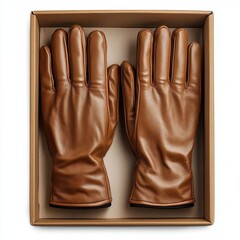 Obraz premium Brown leather gloves in a box isolated on a white background for product display and fashion purposes