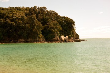 Split Apple Rock on a Sunny Day with Calm Sea – Iconic Coastal Landmark