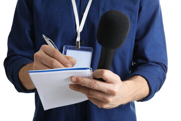 Journalist with microphone taking notes on white background, closeup