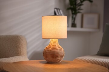 Stylish night lamp on wooden table indoors