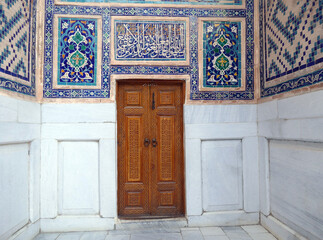 Intricate details of a traditional uzbek doorway, showcasing a fusion of artistry and craftsmanship