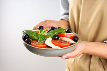 Salad Caprese, concept of tasty and delicious food