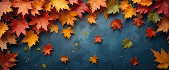 Autumn Leaves Cascade on a Textured Blue Backdrop Creating a Fall Season Motif