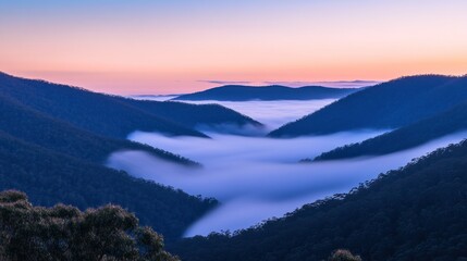 Serene Mountain Valley with Mist at Sunrise
