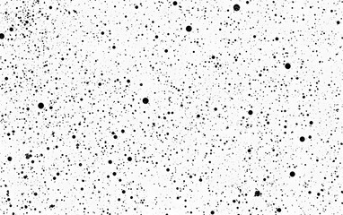 Obraz premium Abstract black dots scattered on white background