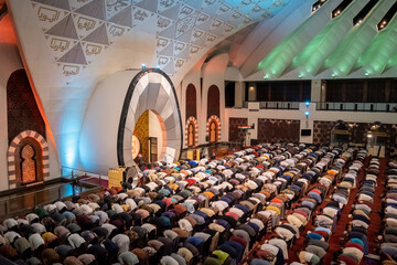 Hundreds of Muslims are praying prostration and praying together at the Great Mosque of West Sumatra or masjid raya sumatra barat, Indonesia