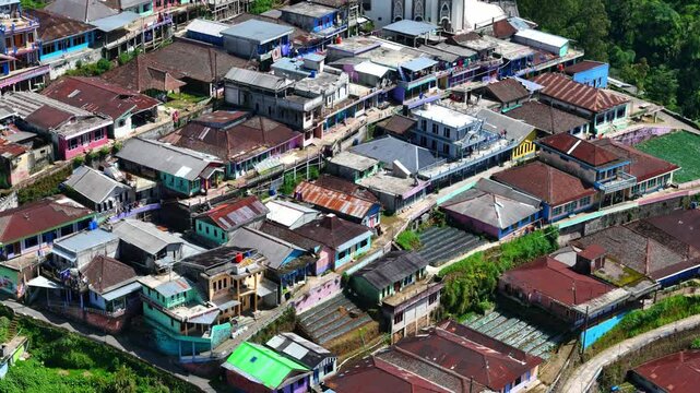 Drone view of rural houses on the mountain slopes. Nepal Van Java village, Mount Sumbing, Indonesia.