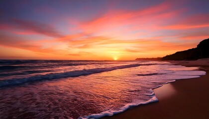 Fototapeta premium Stunning beach sunset with vibrant sky and gentle ocean waves