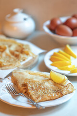 Traditional pancakes served with lemon and sugar for Shrove Tuesday/Pancake Day celebration