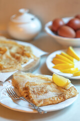 Traditional pancakes served the English way with lemon and sugar to celebrate Shrove Tuesday/Pancake Day