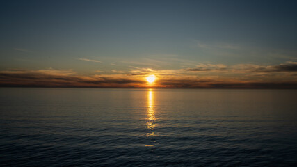 Obraz premium sunset over the river