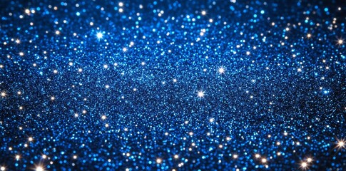 Abstract background with blue glitter lights and bokeh, defocused glowing effect.