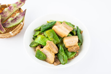 A dish of braised pork with beans