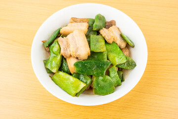 A dish of braised pork with beans