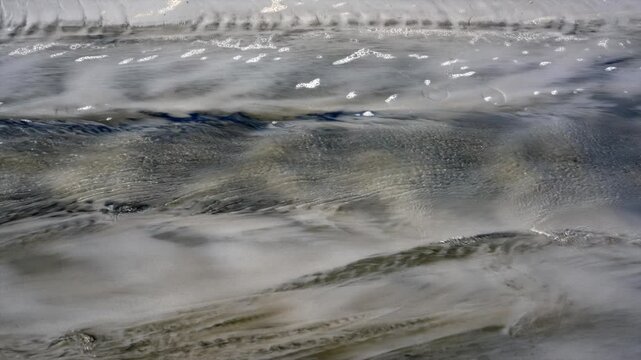 Sand Washed Away by the Water Stream &ndash; Natural Erosion in Action