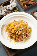 Fried squid tentacles with salted egg yolk, bean sprouts and crystal vermicelli