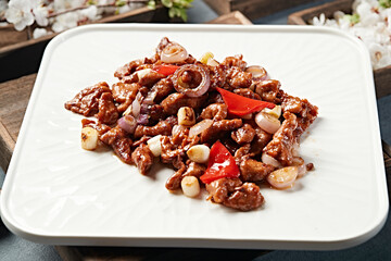 Braised beef tenderloin with scallions and bell peppers
