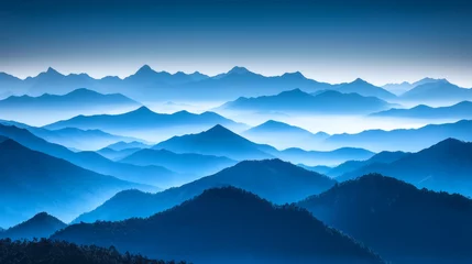 Fotobehang Blue mountain ridges layers in morning mist, dreamy foggy landscape with dramatic misty haze and scenic peaks © Mavita