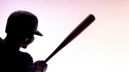 A silhouette of a baseball player poised to hit, capturing the essence of sport and athleticism.