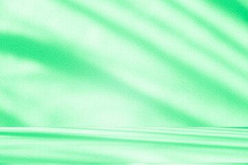 Wall interior background, studio and backdrops show products. with leaf shadow from window color green and white. background for text insertion and presentation of product	