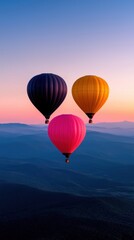 Fototapeta premium Stunning sunset view with colorful hot air balloons soaring above serene mountains and valleys.