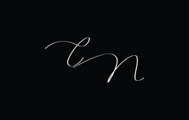 A minimal yet stylish depiction of white cursive lettering forming CN on a dark background, symbolizing elegance and simplicity.