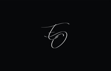 A minimal yet stylish depiction of white cursive lettering forming EO on a dark background, symbolizing elegance and simplicity.