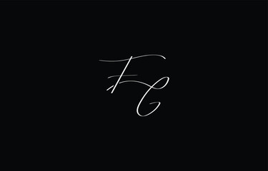 A minimal yet stylish depiction of white cursive lettering forming FG on a dark background, symbolizing elegance and simplicity.
