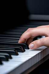 Fototapeta premium A hand plays a melody on a piano. Focus on the hand and keys for music use. Generative AI