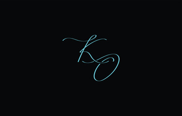 A minimal yet stylish depiction of white cursive lettering forming KO on a dark background, symbolizing elegance and simplicity.