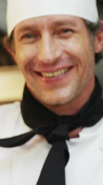 Chef showing tray of croissants