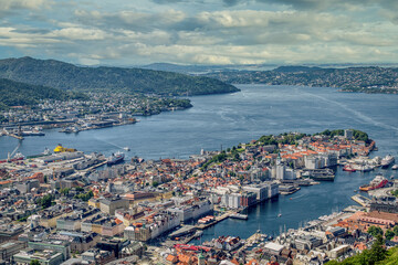 Bergen is a city on the southwest coast of Norway. It is surrounded by mountains and fjords, including the Sognefjord, the longest and deepest fjord in the country.