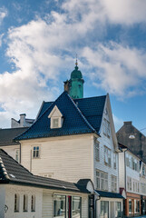 Obraz premium Bergen is a city on the southwest coast of Norway. It is surrounded by mountains and fjords, including the Sognefjord, the longest and deepest fjord in the country.